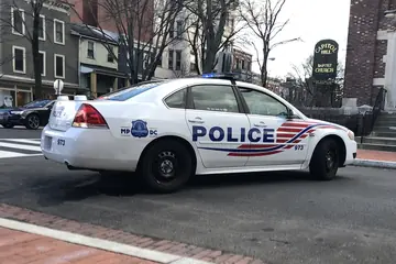 Washington, D.C., Metropolitan Police Chevrolet Impala patrol car in white with red and blue stripes