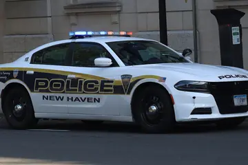 New Haven, Connecticut, police Dodge Charger Pursuit in white with a lightbar